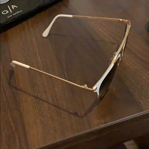 White and gold sunglasses
